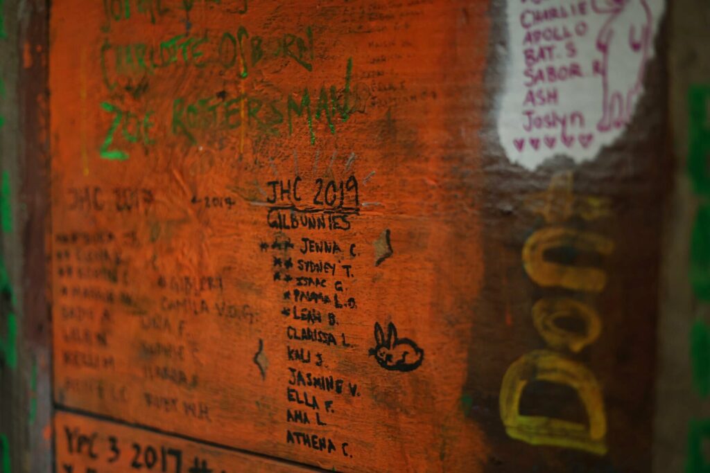 Camper graffiti on the walls at Rowe Camp